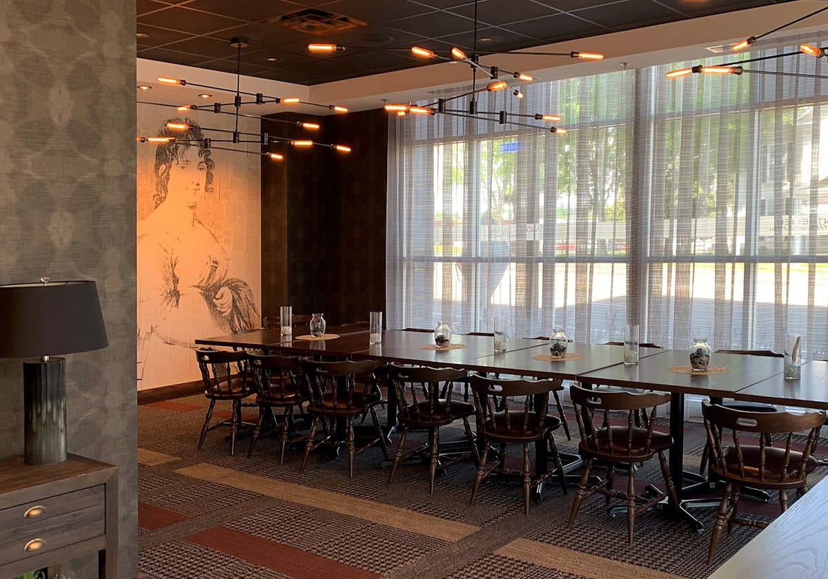 a dining room table in front of a building