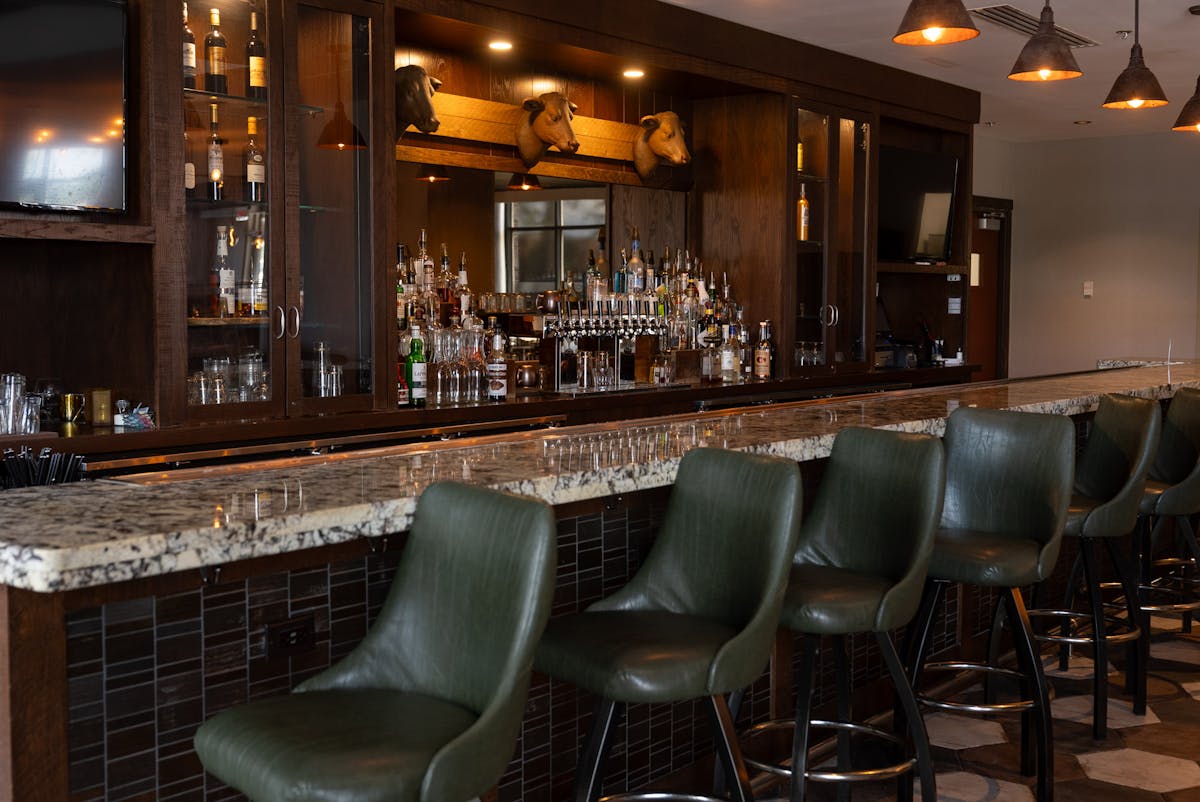 a bar top with open seats