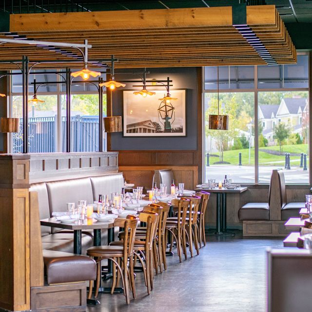 a restaurant with tables and chairs
