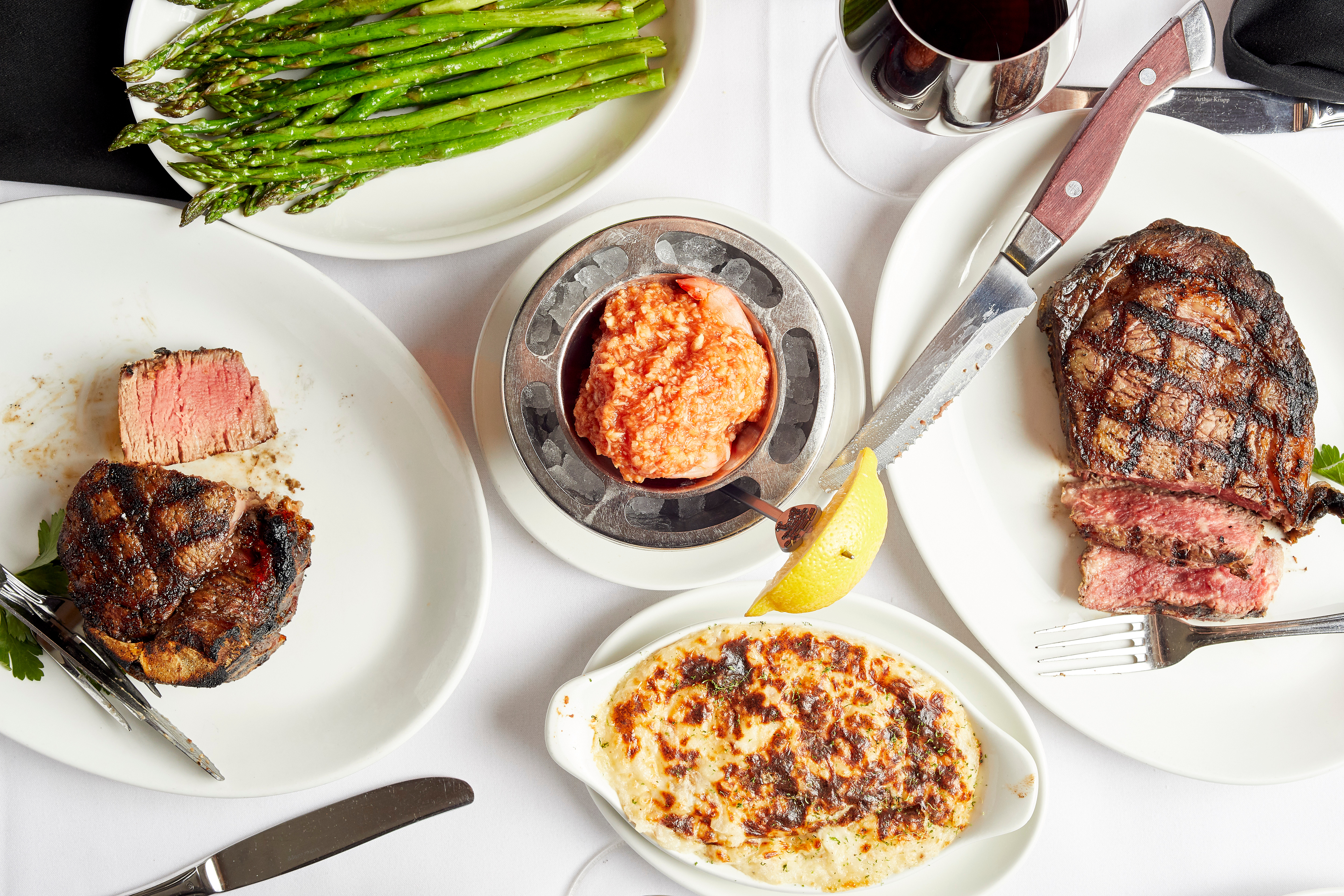 a table topped with different types of food on a plate