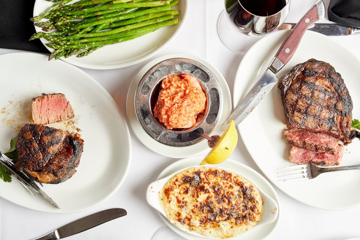 a table topped with different types of food on a plate
