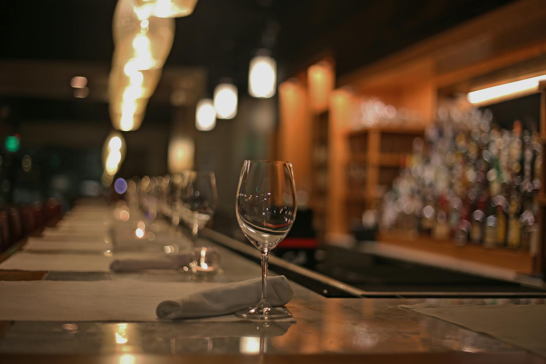 a glass of wine on a table