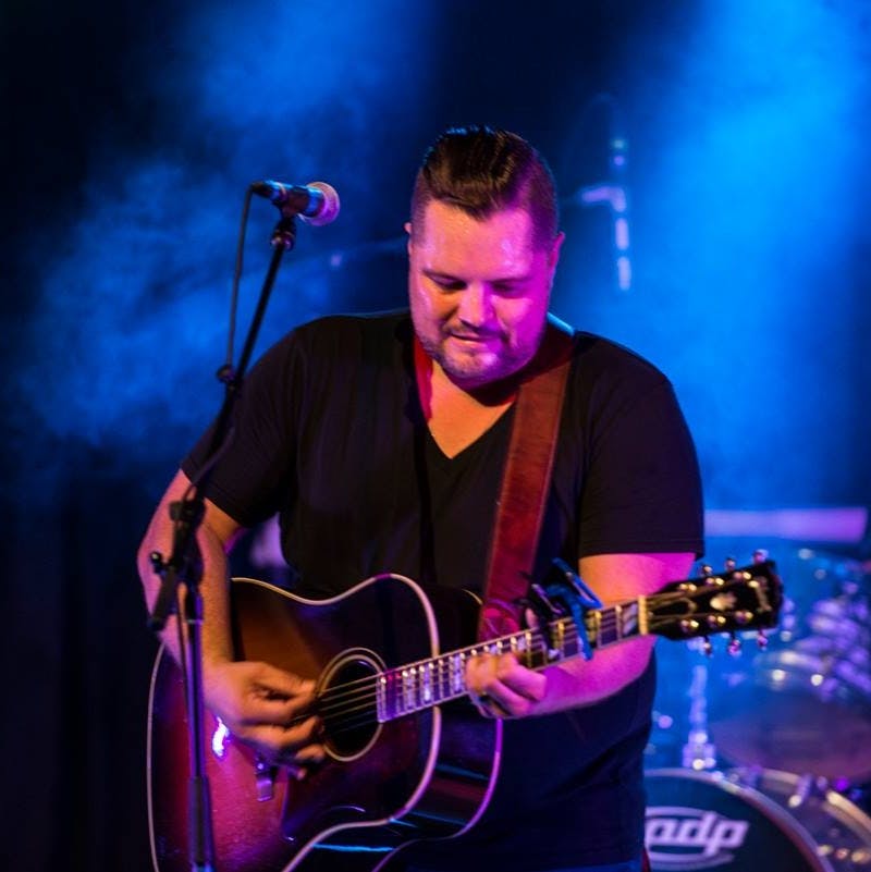 a man standing on a stage