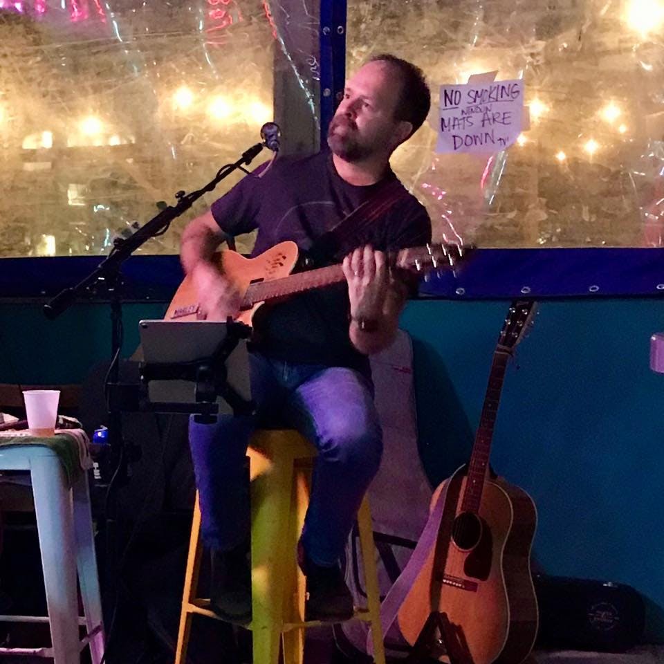 a man standing on a stage