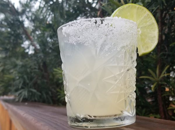 a glass cup on a table