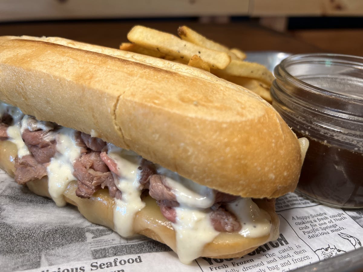 a close up of a hot dog on a bun