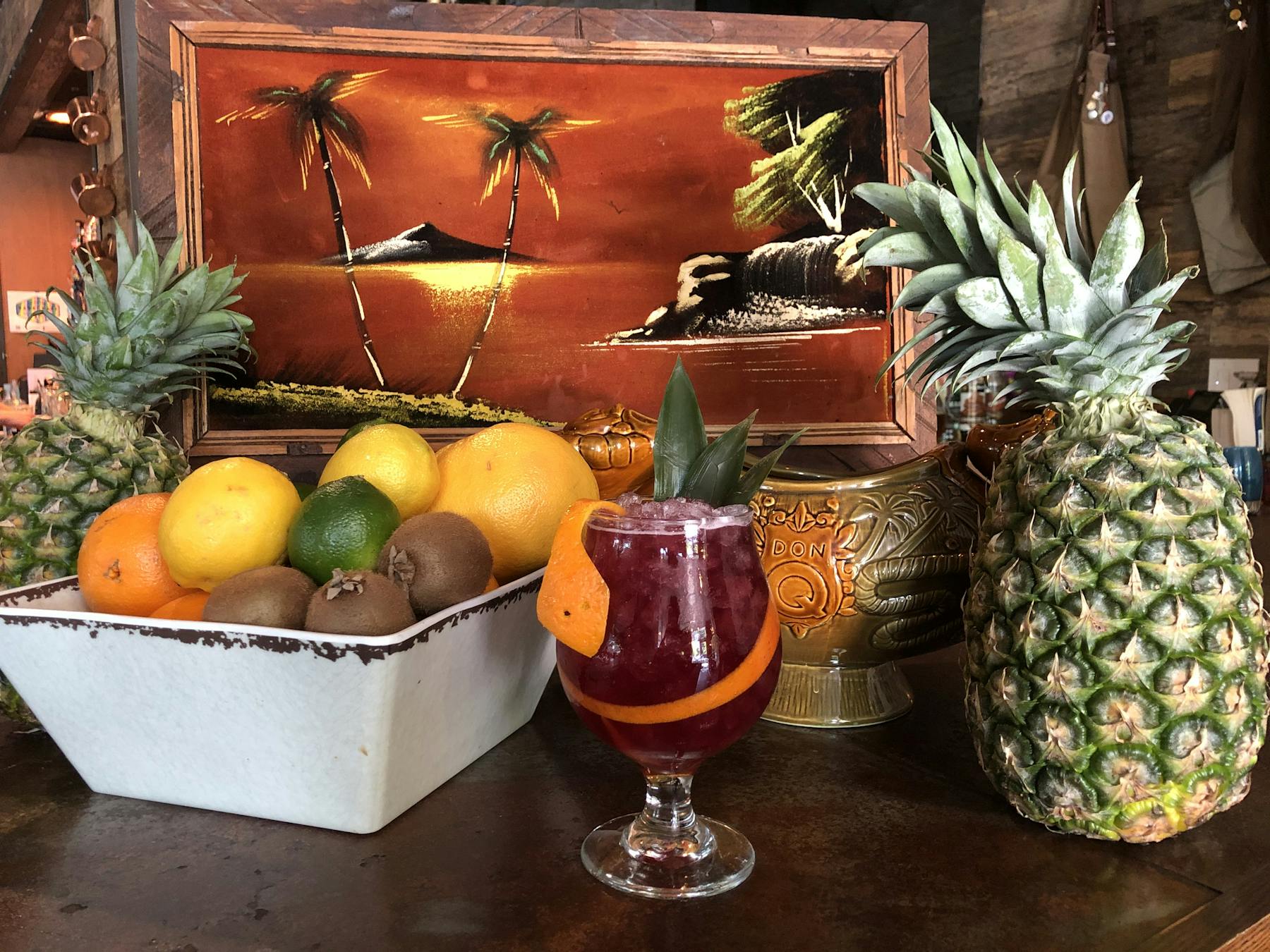 a group of oranges on a table