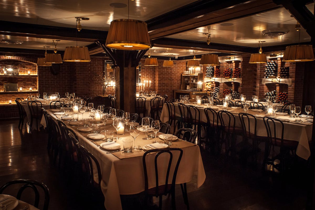 a dining room table in front of a building