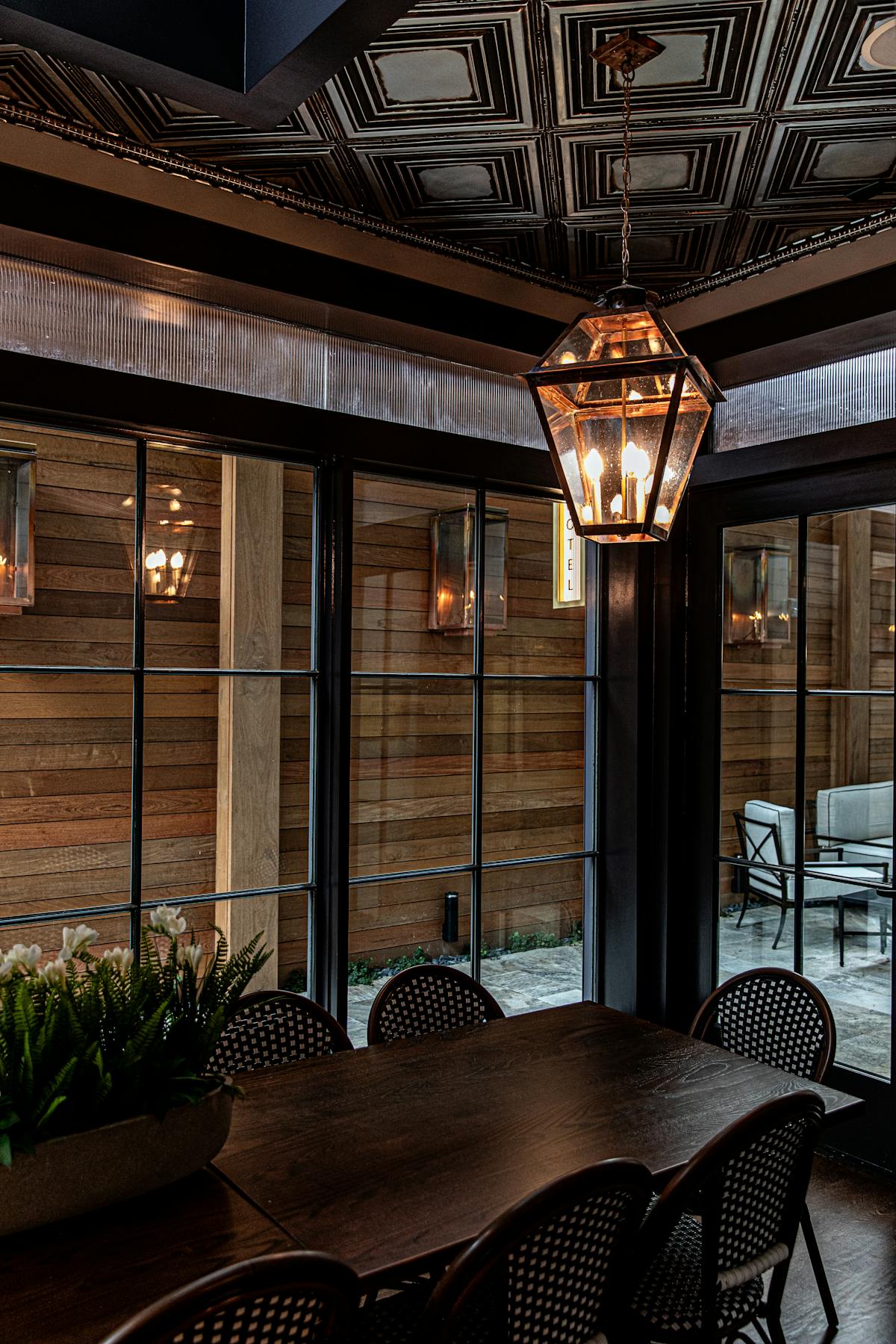 a dining room table in front of a building