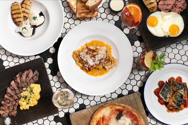 a table topped with plates of food on a plate