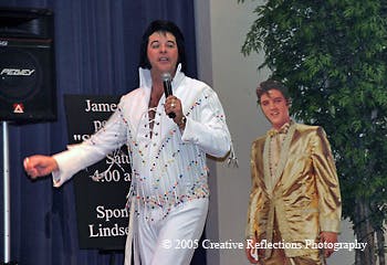 a person dressed as Elvis posing for the camera