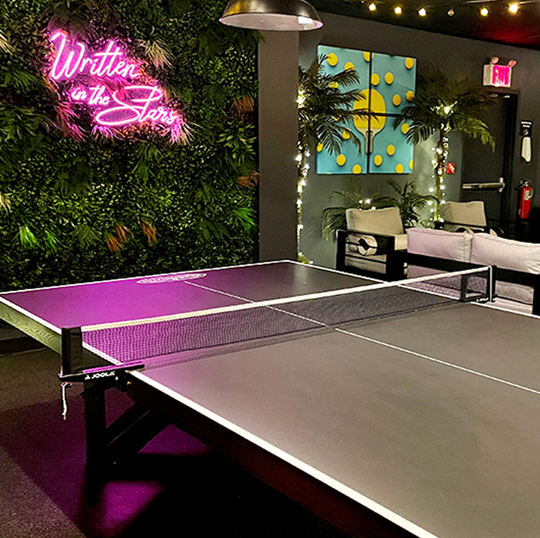 a room that has a sign on a table