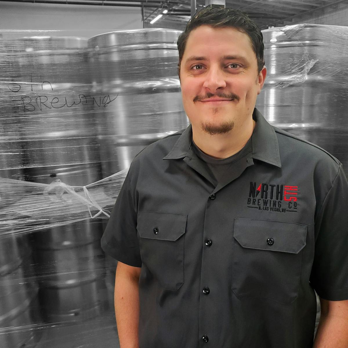 a man smiling for the camera