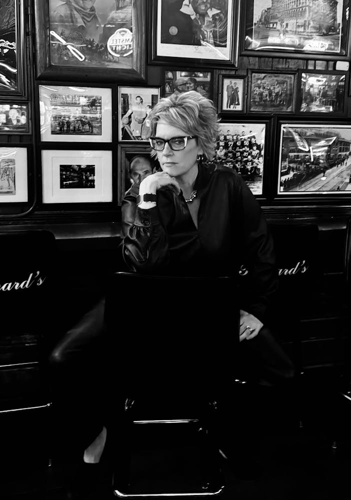 a person in glasses looking at the camera