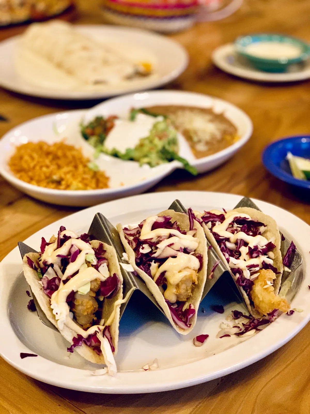a table topped with plates of food