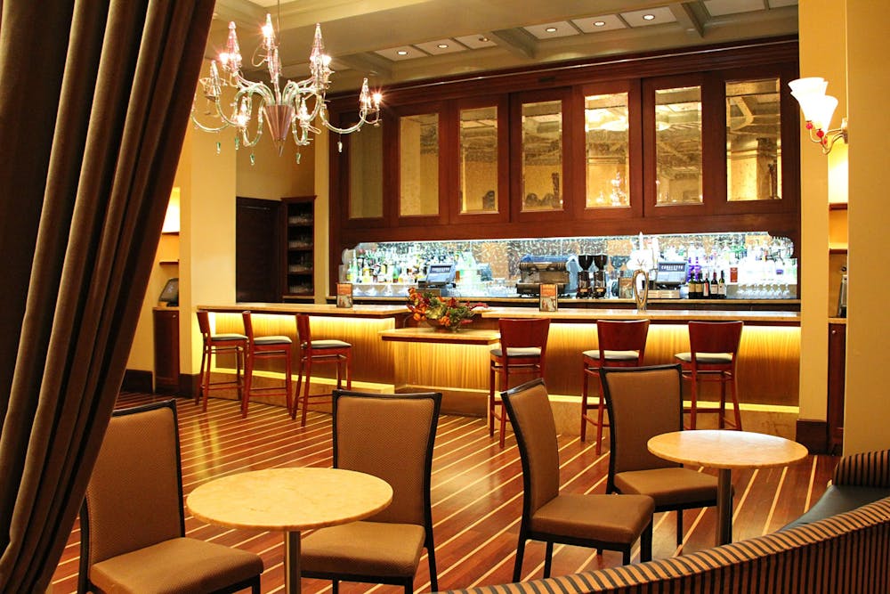 a living room filled with furniture and a large window