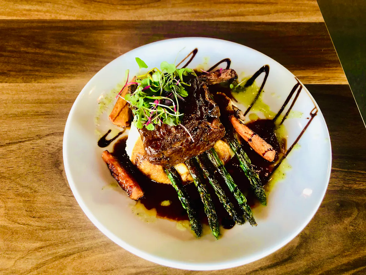 Close up of a white plate topped with our Shortrib