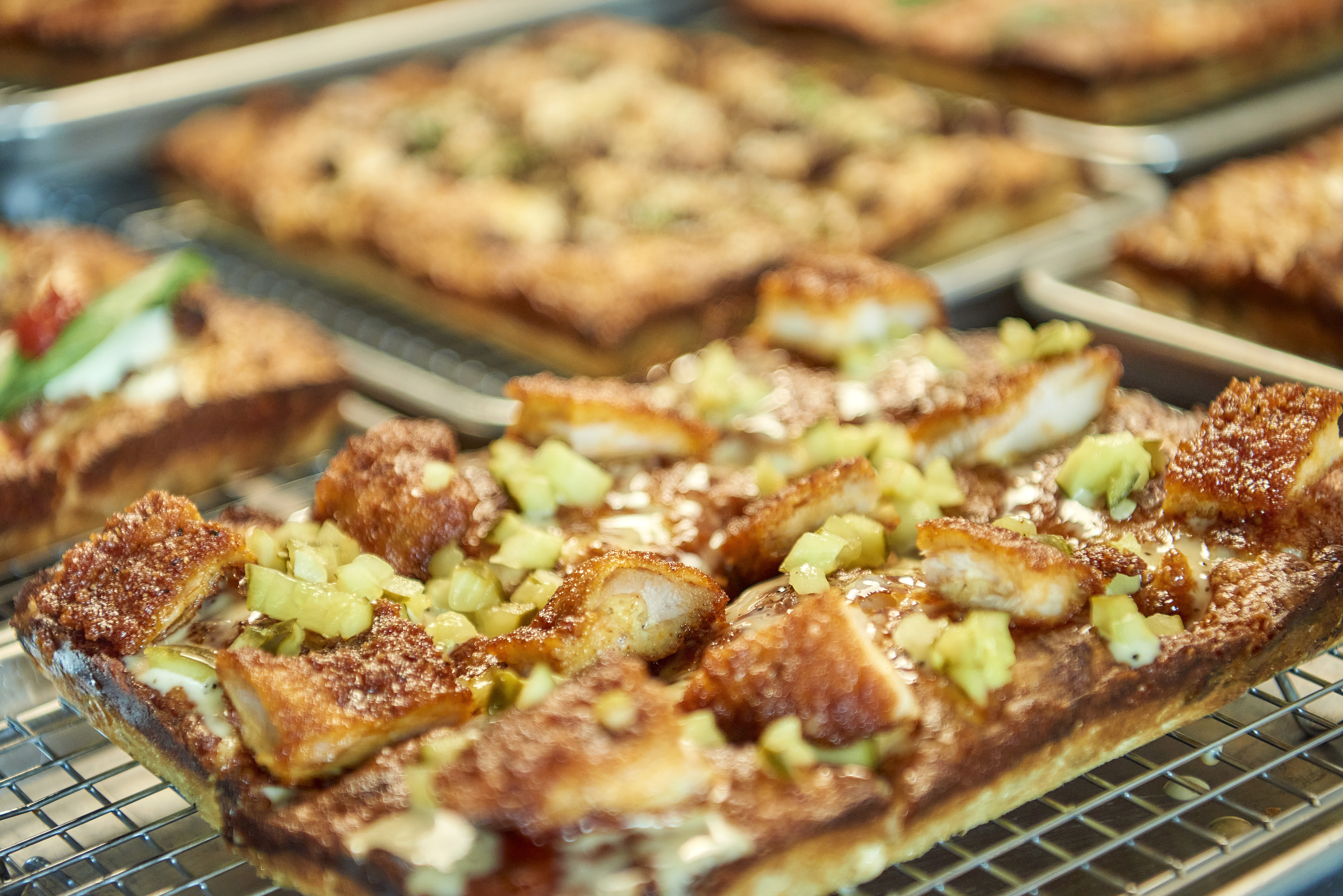 a pizza on a grill