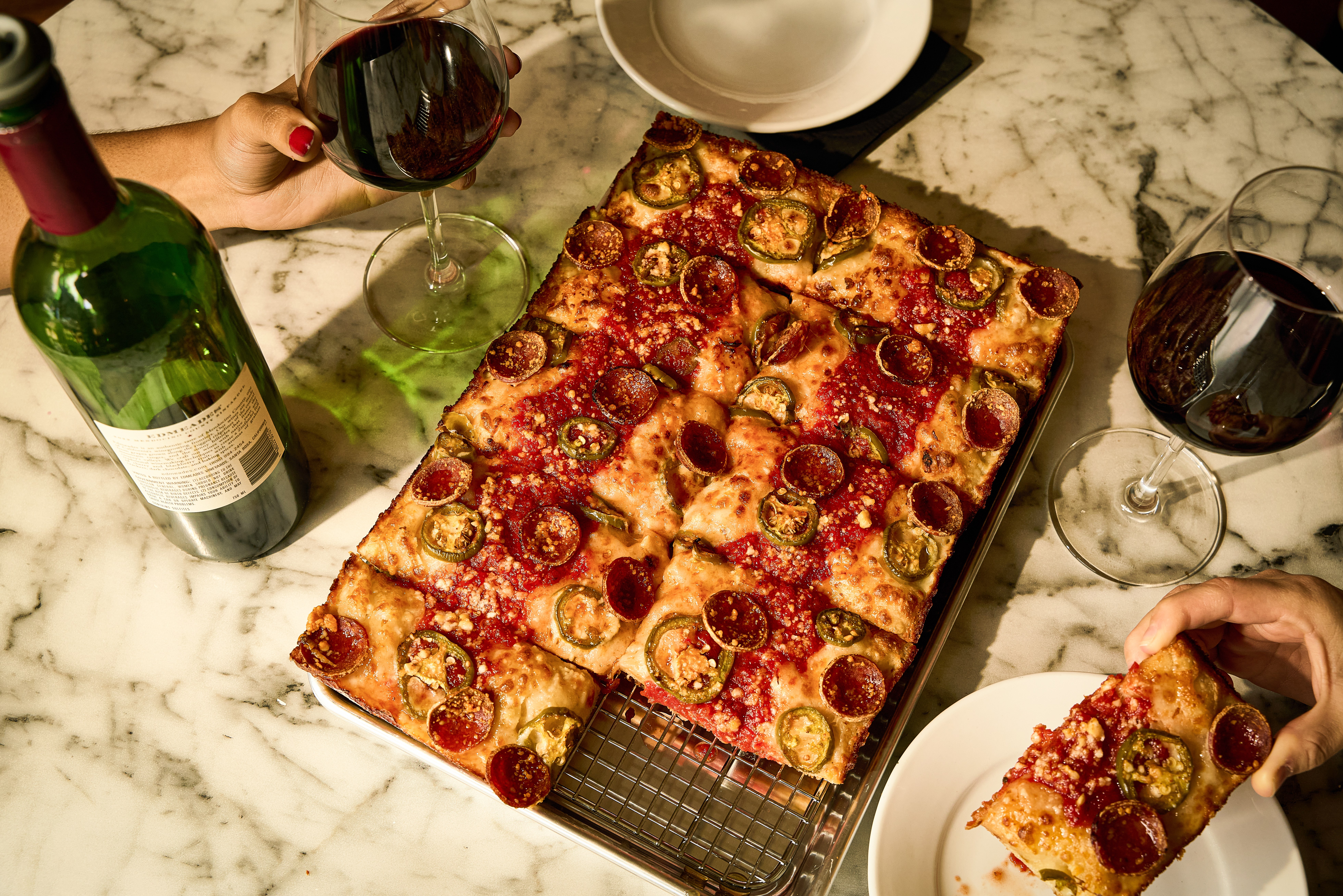 a pizza sitting on top of a table