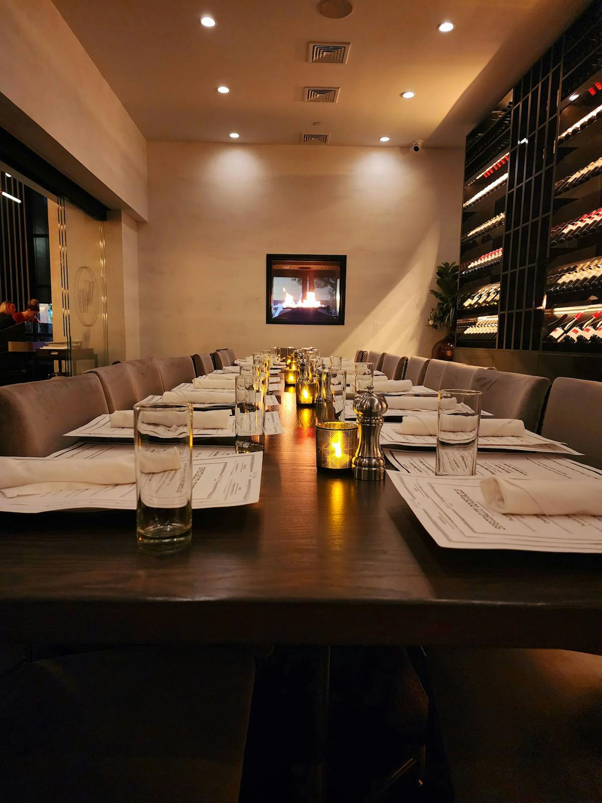 a room filled with furniture and vase on a table