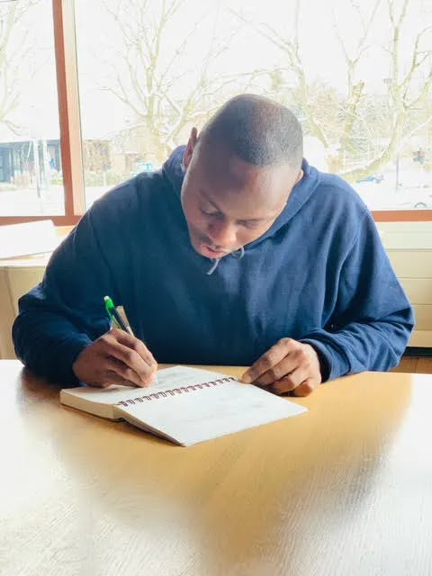 a man sitting on a table