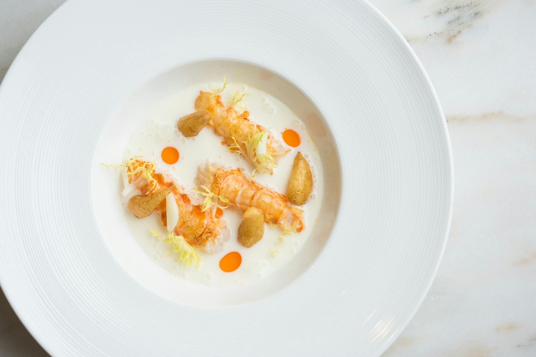a plate of food served on a white plate