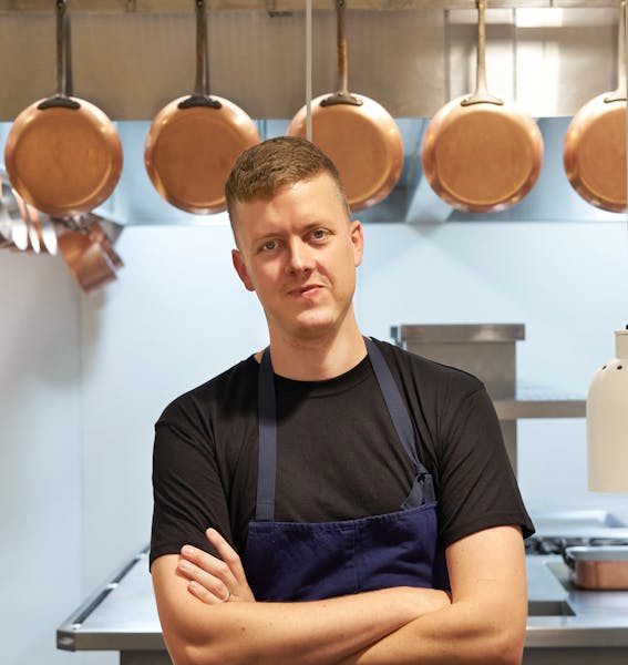 a man sitting on a counter