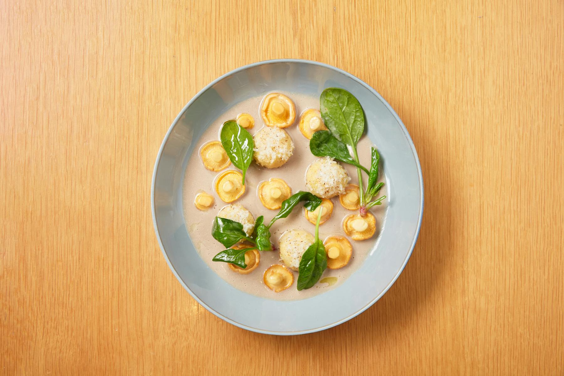 a plate of food on a wooden table