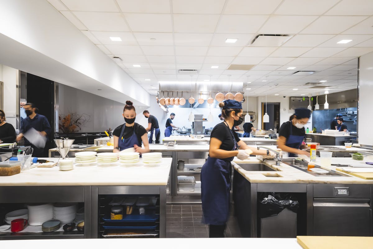 a person preparing food in a kitchen