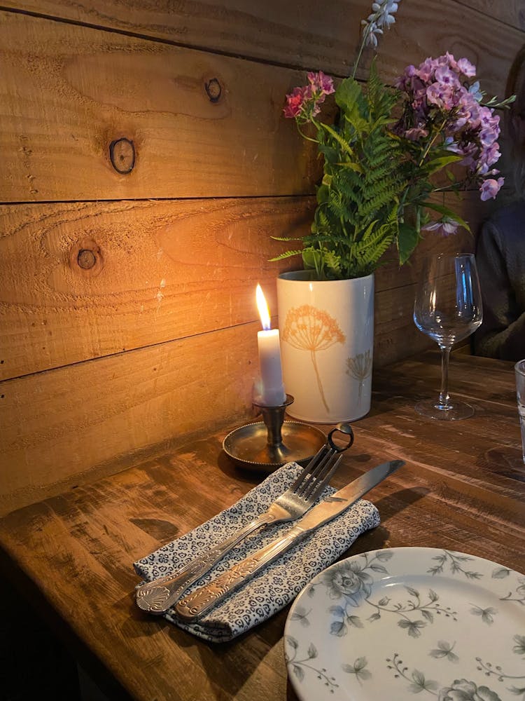 a vase of flowers on a table