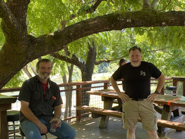 Peter and Scott on the deck at Stumptown Brewing.