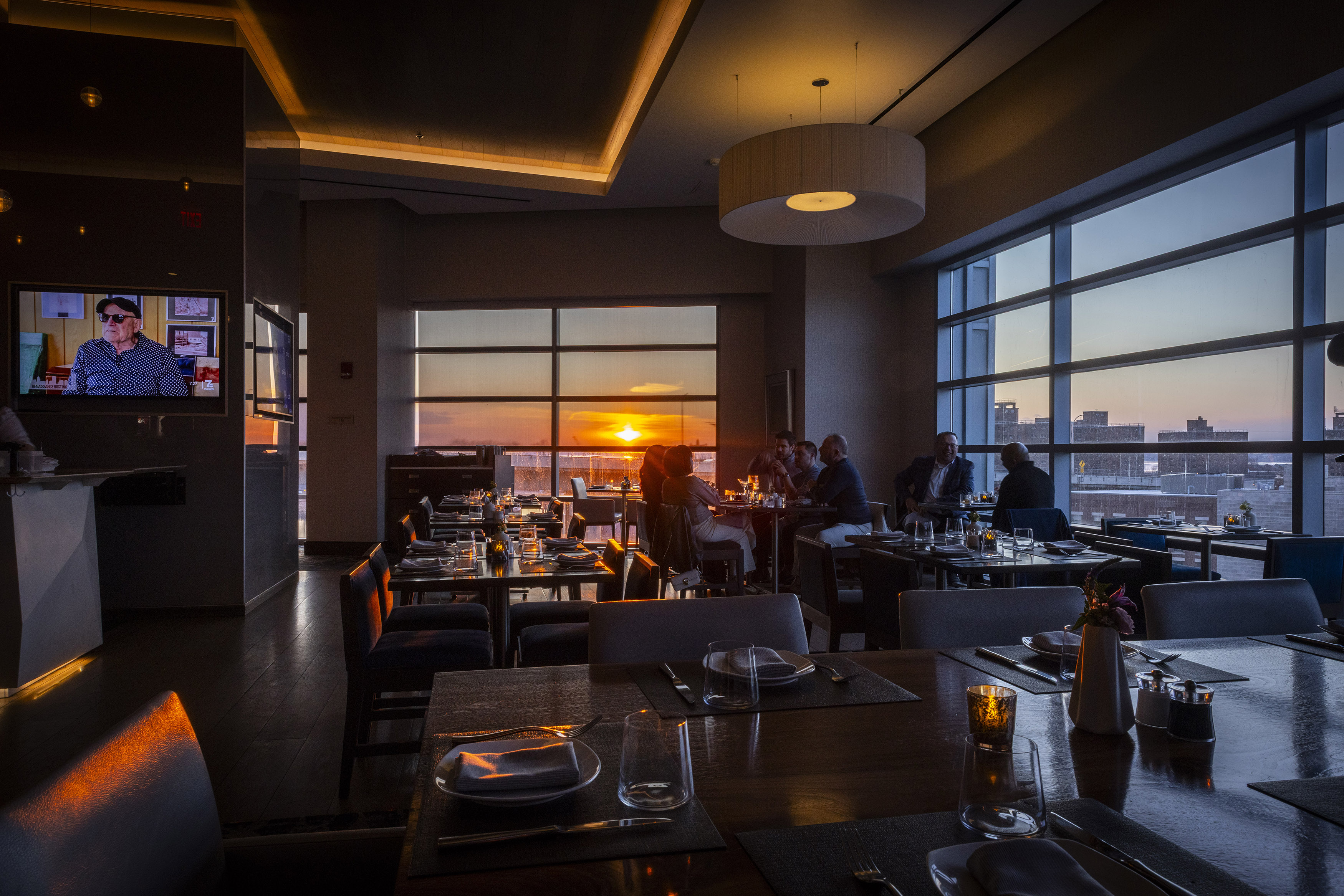 a room filled with furniture and a large window