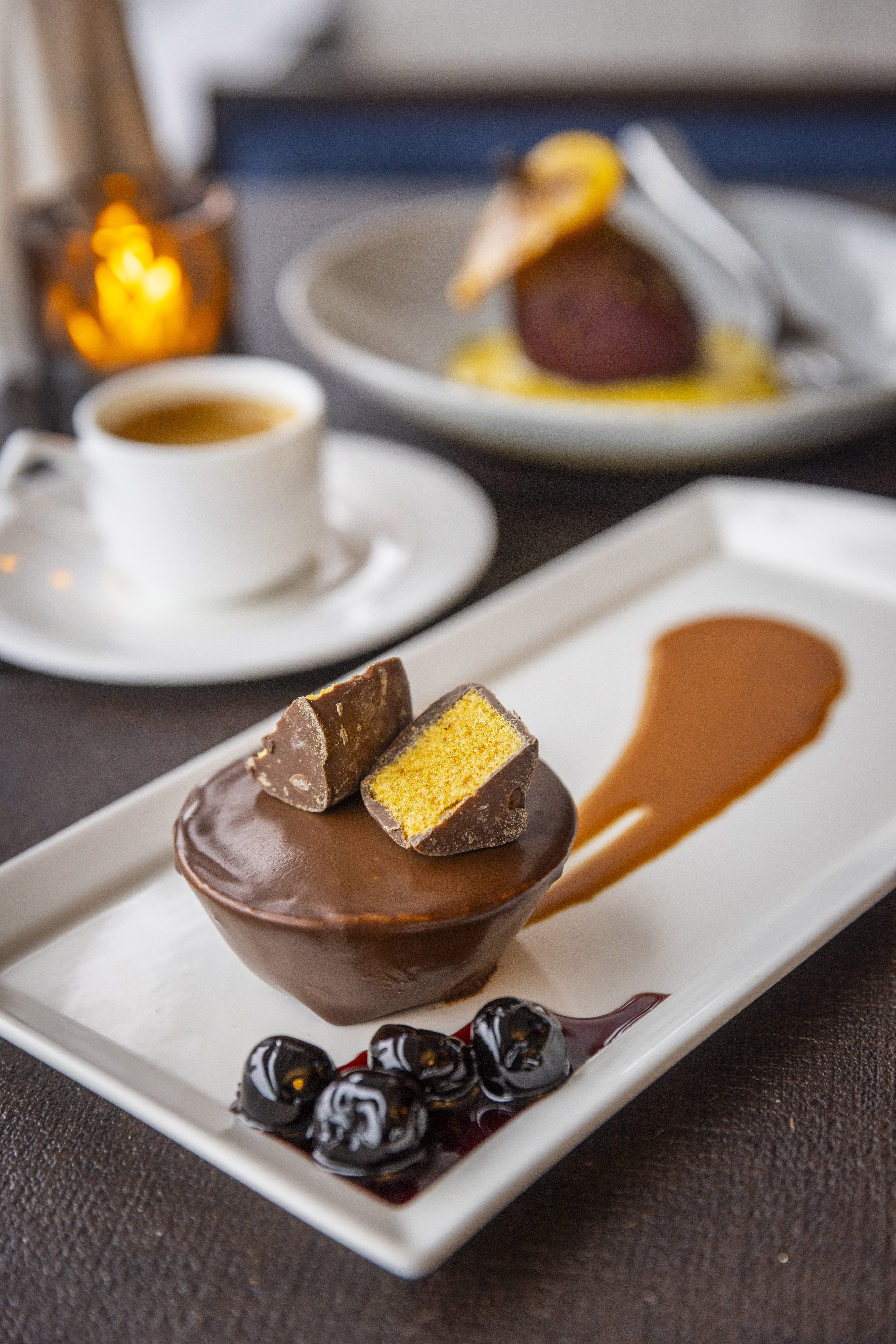 a plate of food and a cup of coffee