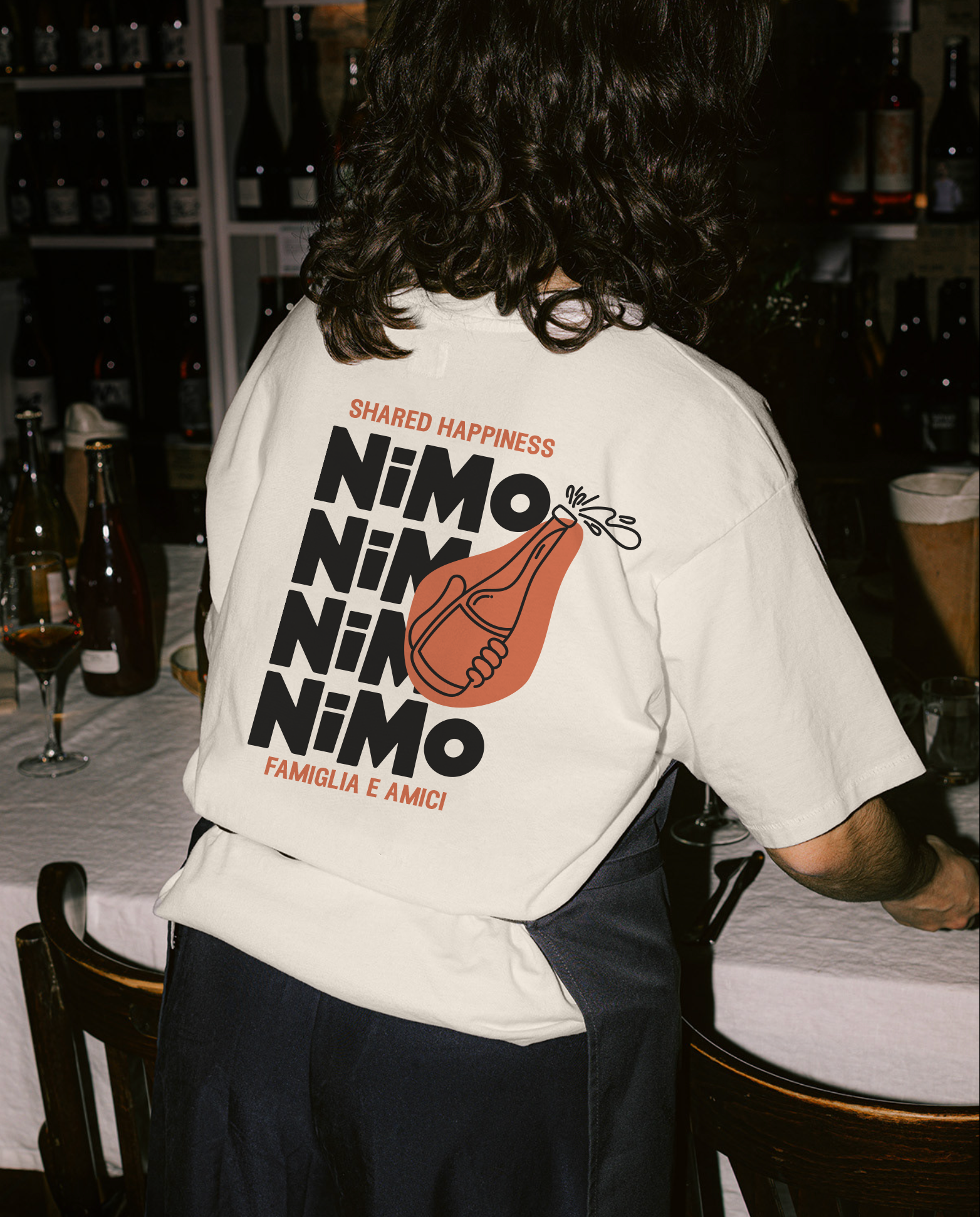 a person standing in front of a table