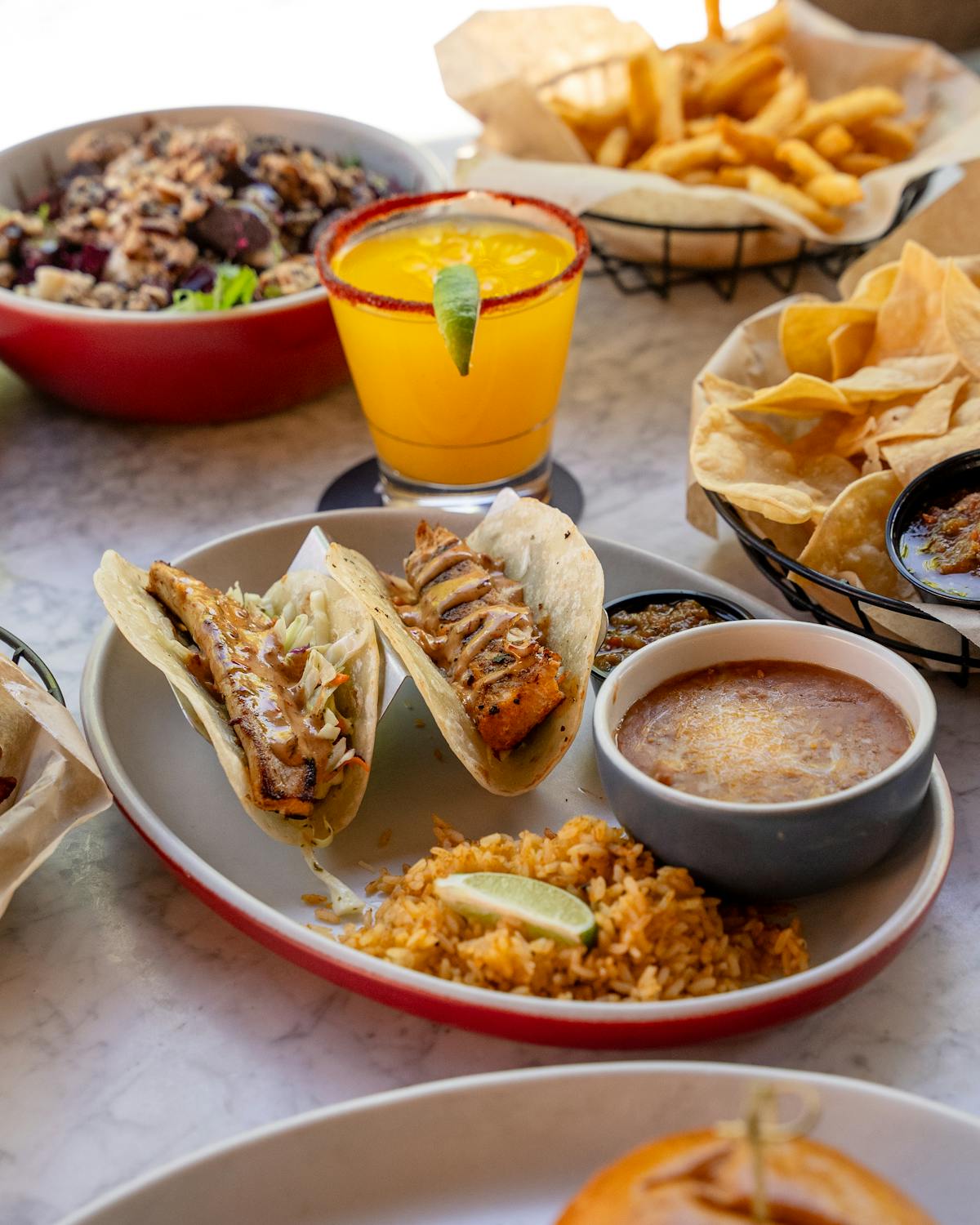 a table topped with plates of food on a plate