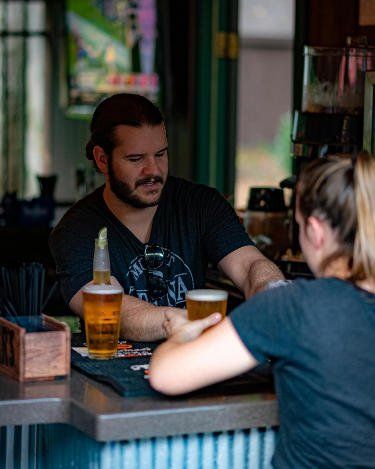 a bartender serving drinks