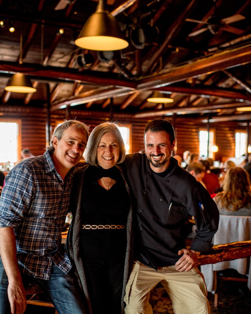 the poulos family posing for a photo