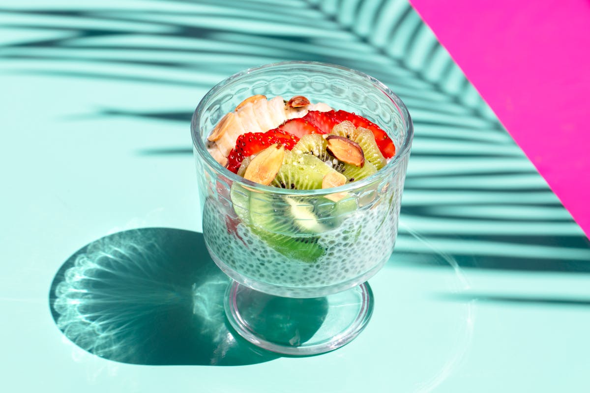 chia pudding with fruit on a glass cup