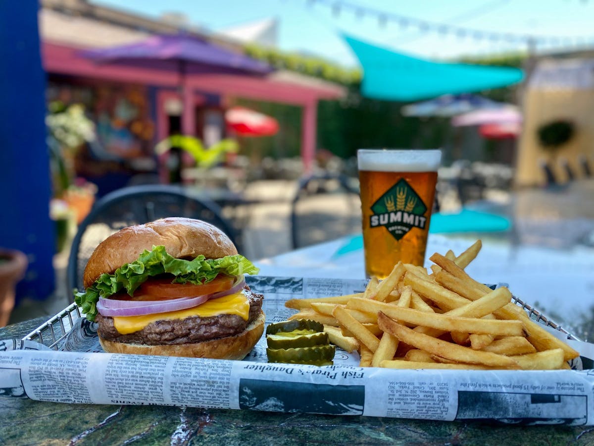 a sandwich and fries on a table