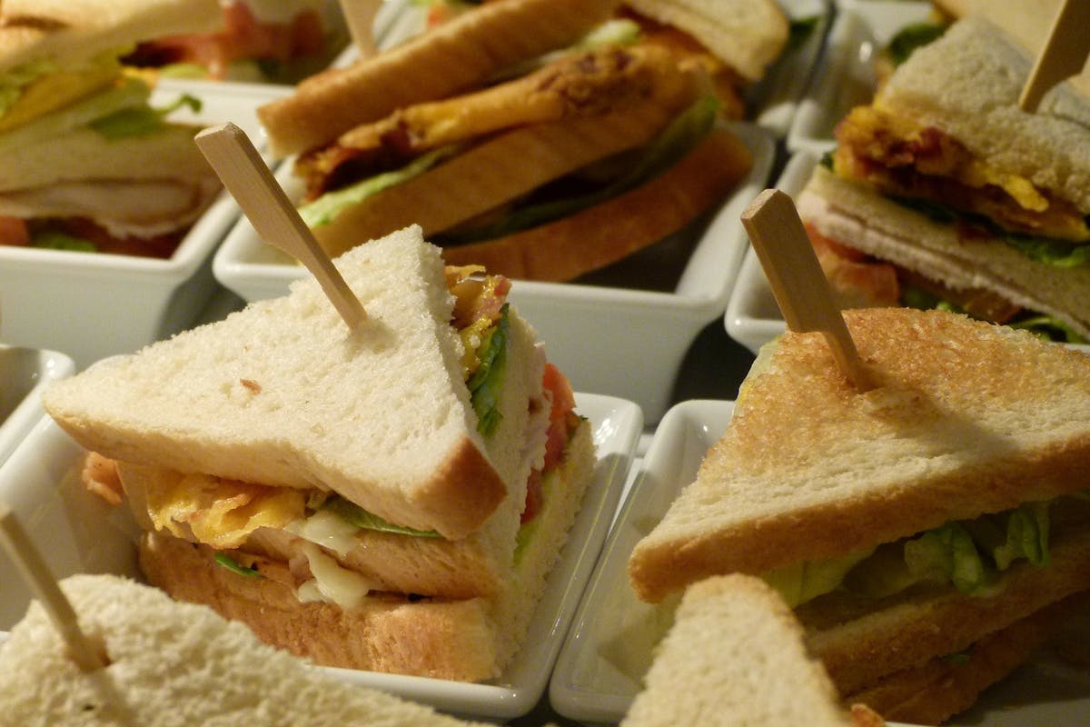 a sandwich cut in half on a plate