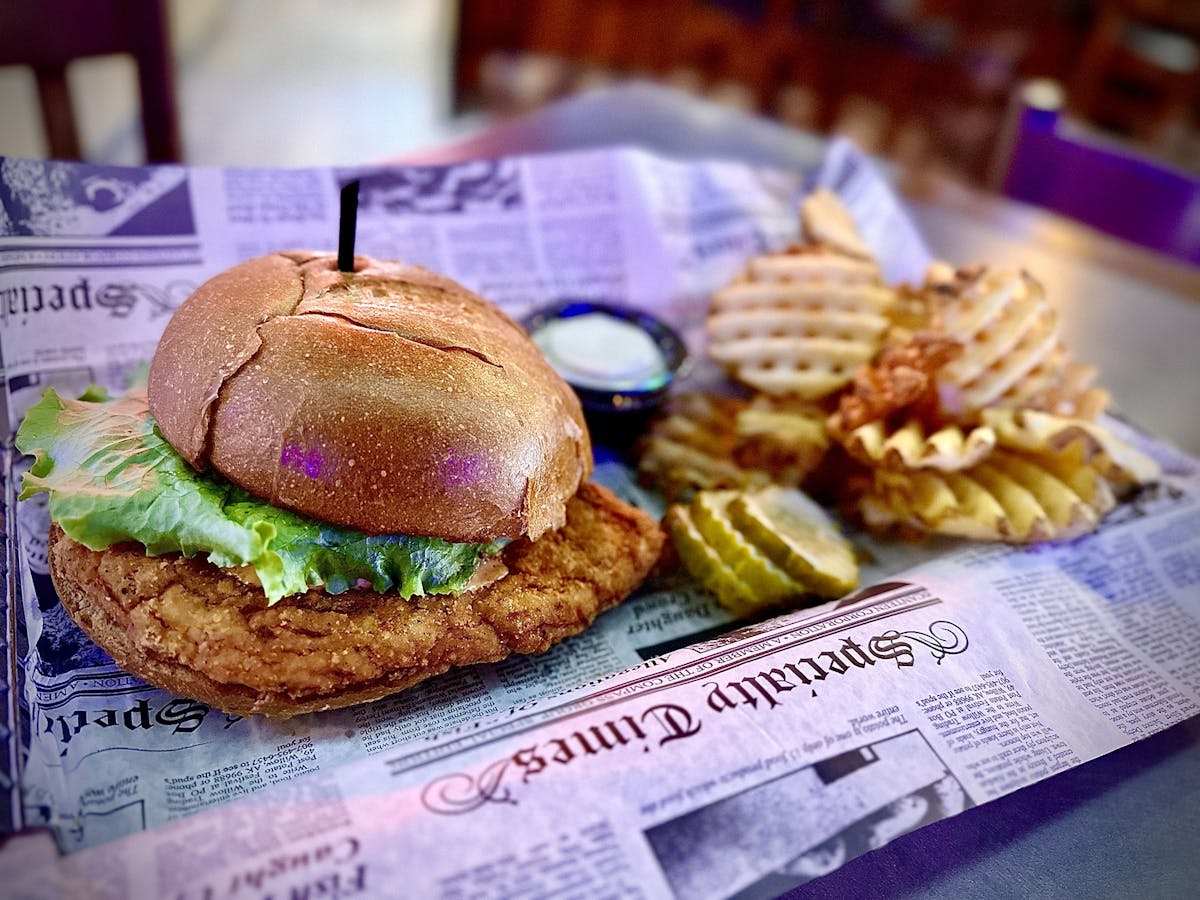 a close up of a sandwich sitting on top of a table