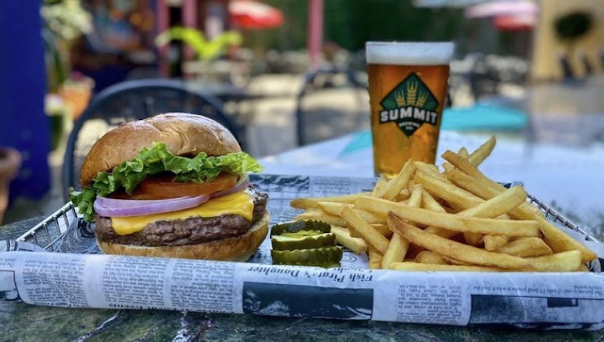 a sandwich and fries on a table