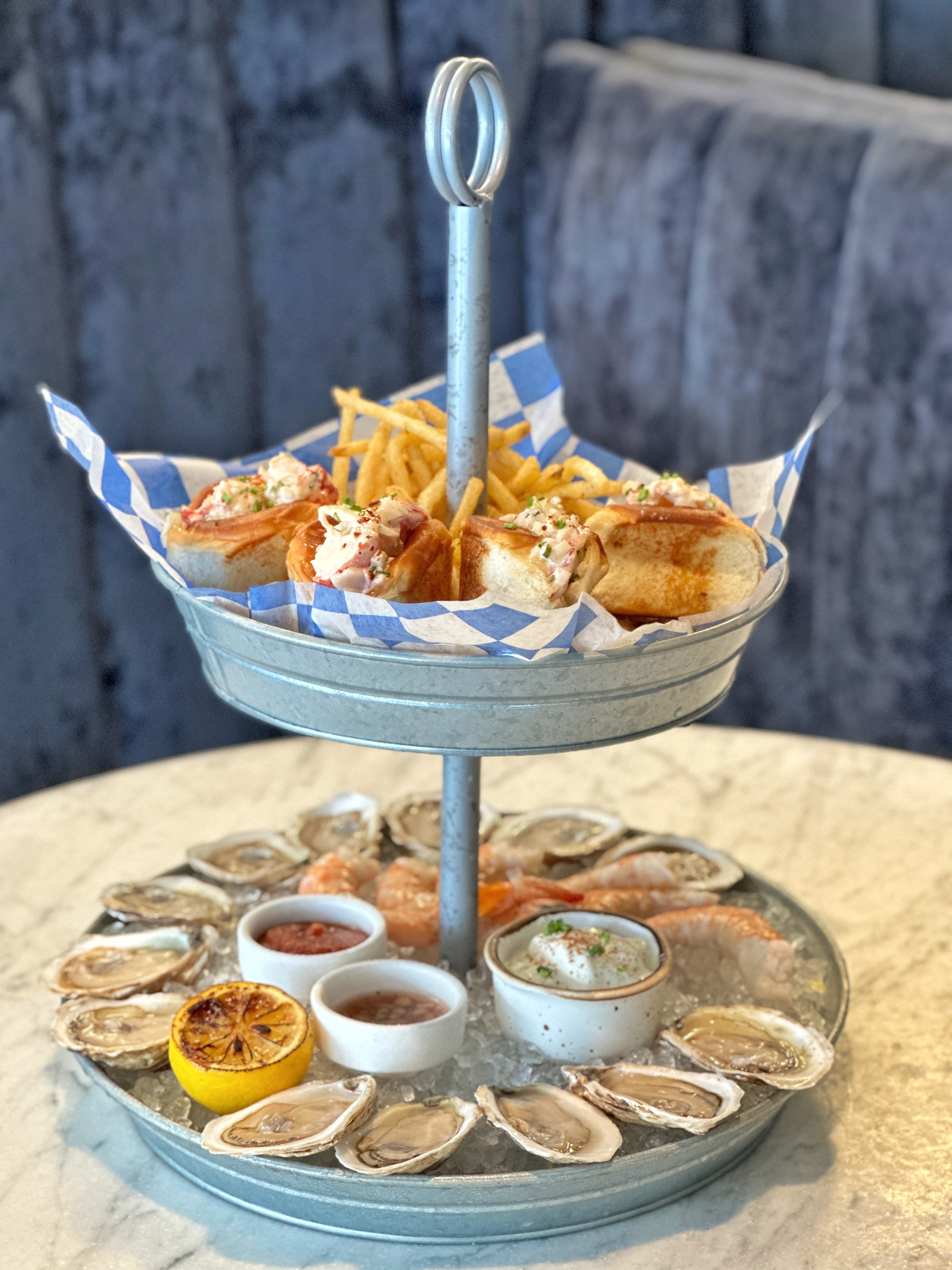 a bowl of food on a plate on a table