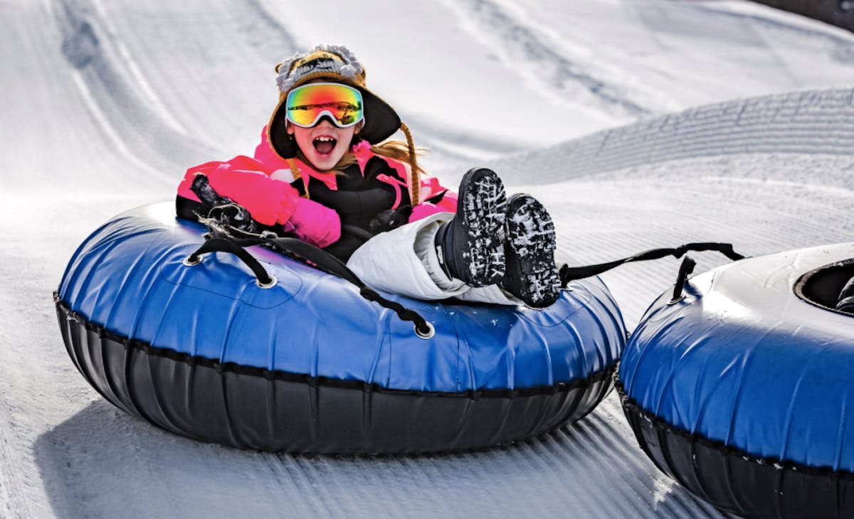 a person lying on the snow