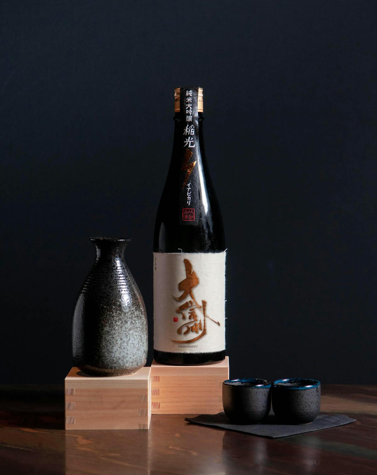 a glass bottle sitting on a table