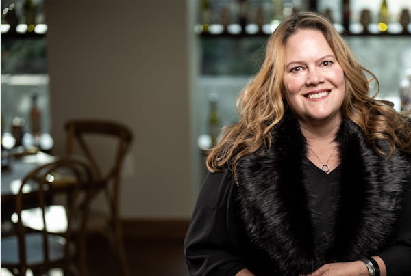 a woman smiling for the camera