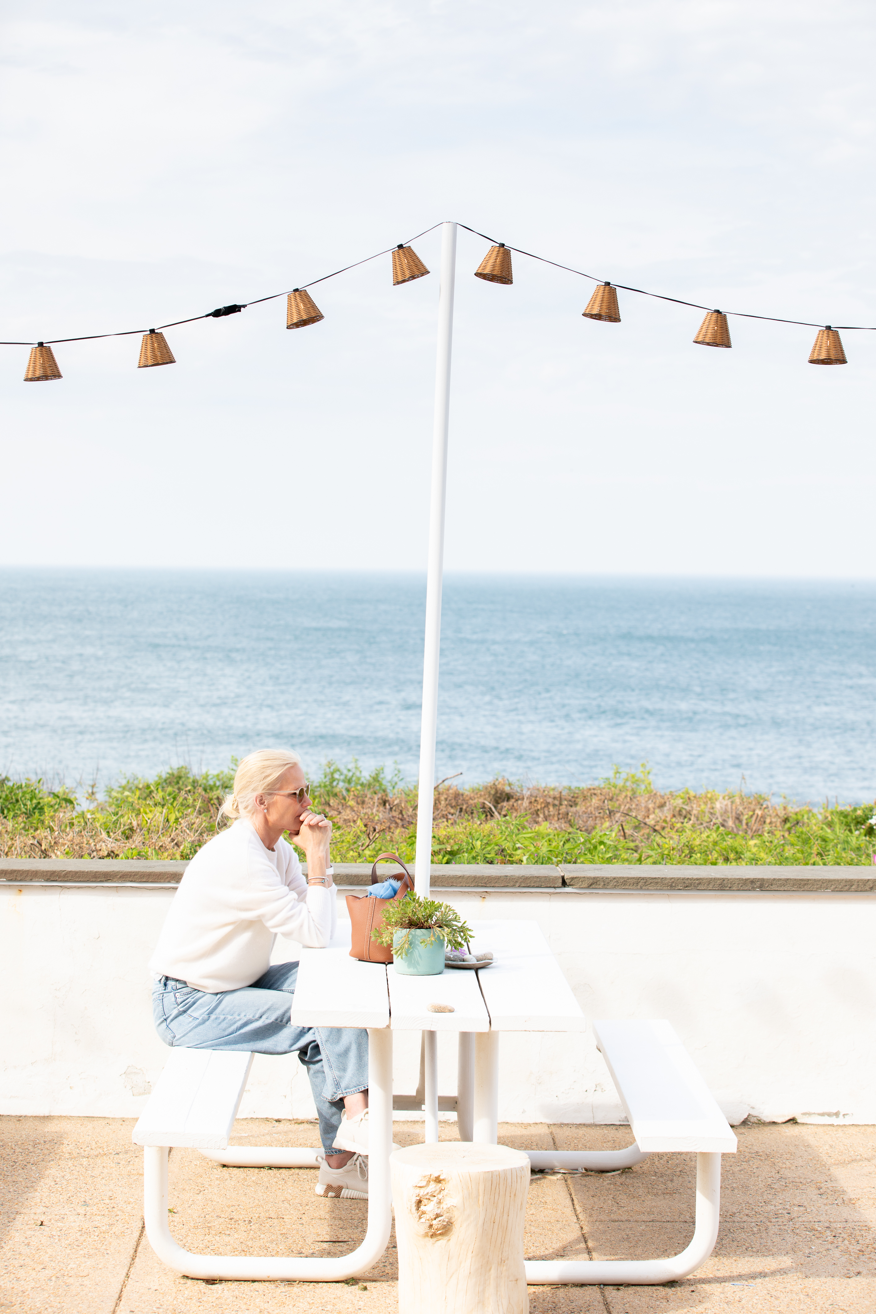 a woman sitting at a table