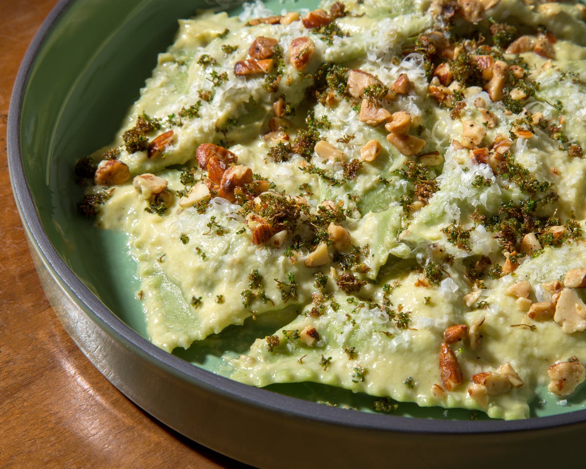 a bowl of food with broccoli