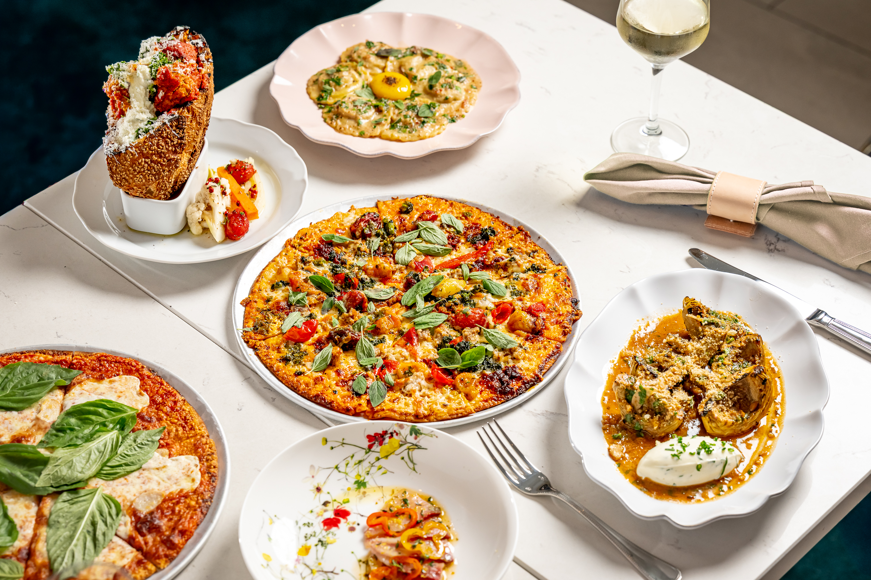 a table topped with different types of food on a plate