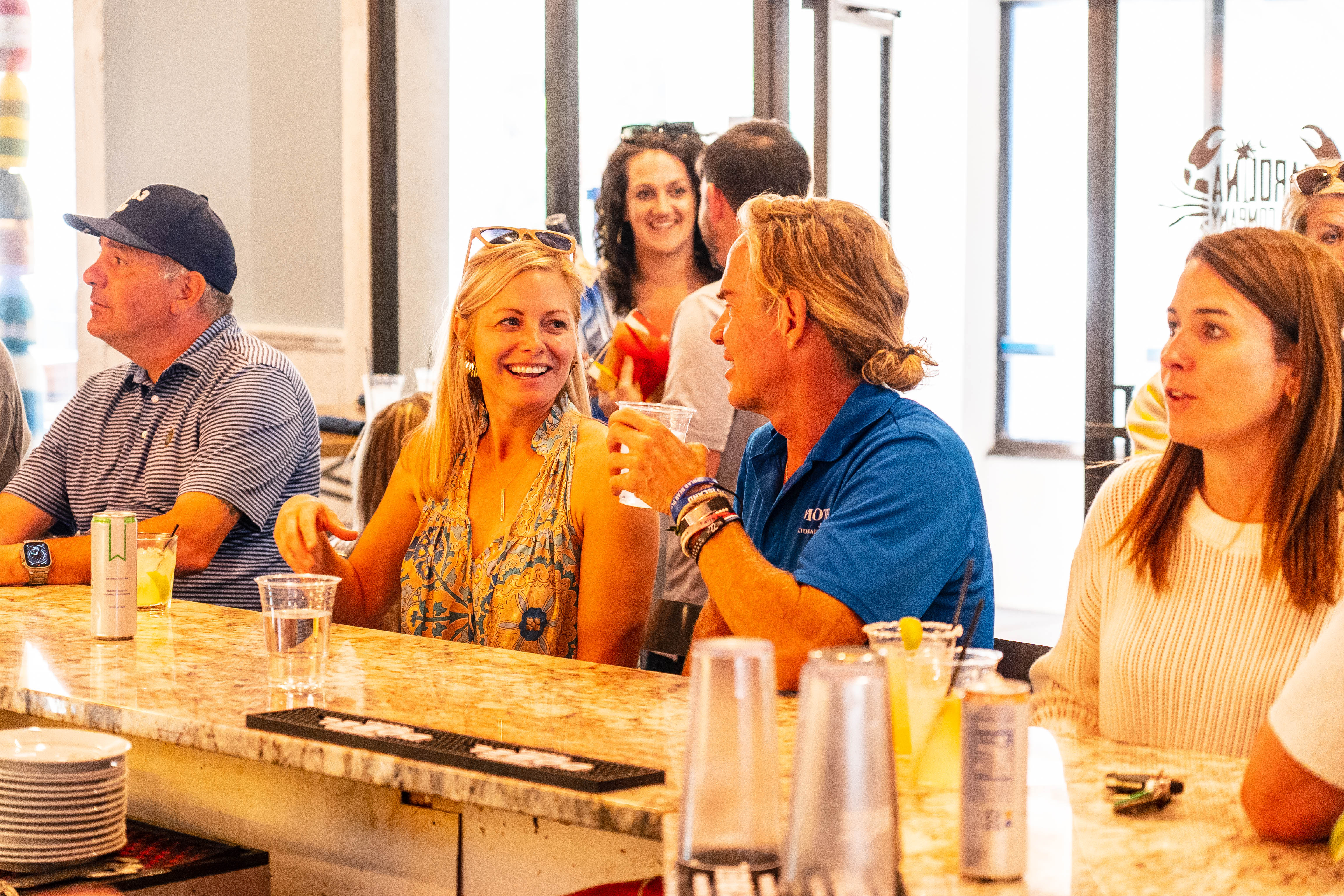 a group of people sitting at a table